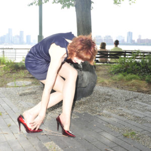 West Village Model Karen Rempel caresses her Candy Apple Red high heels