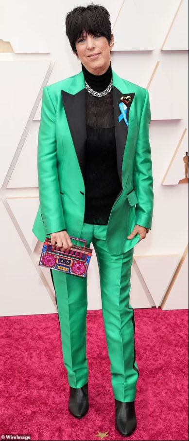 Diane Warren in kelly green with the coolest handbag ever