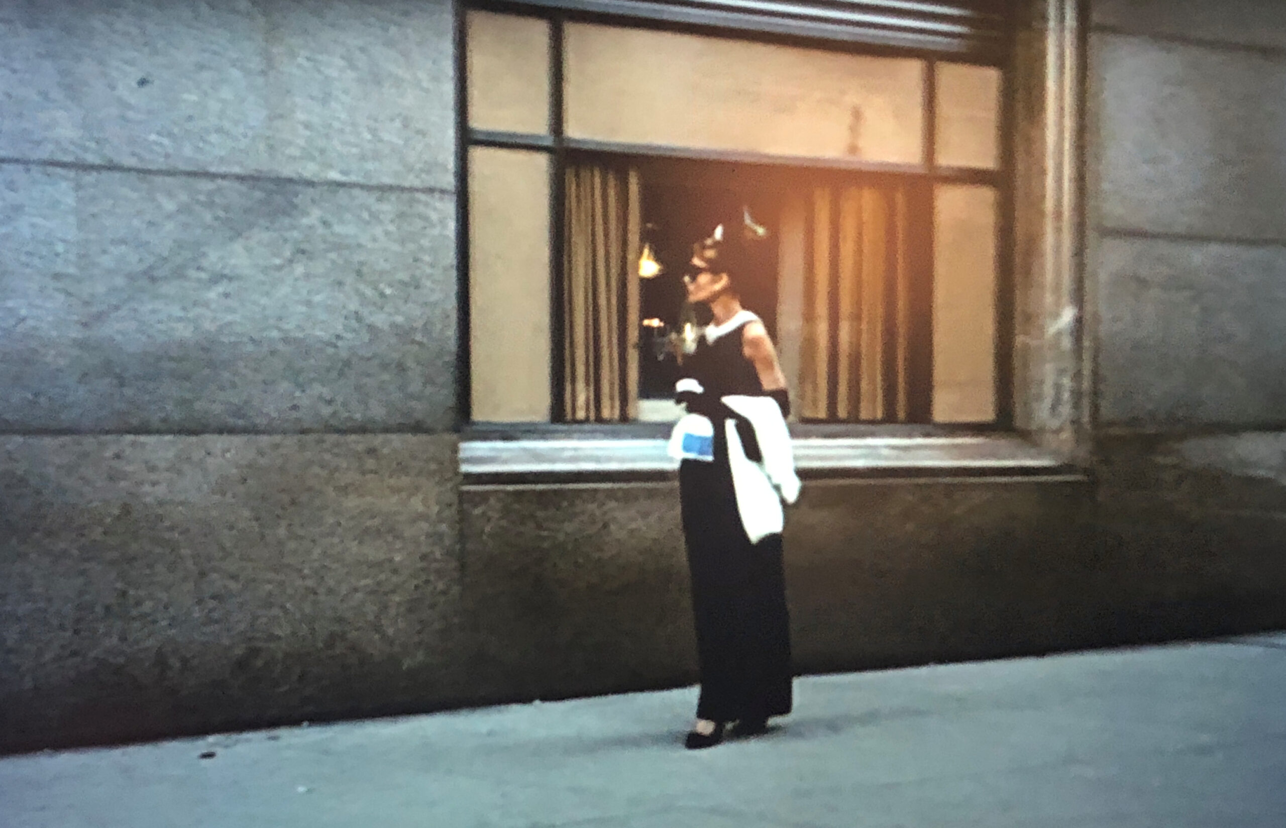 Audrey Hepburn in front of the Tiffany's window