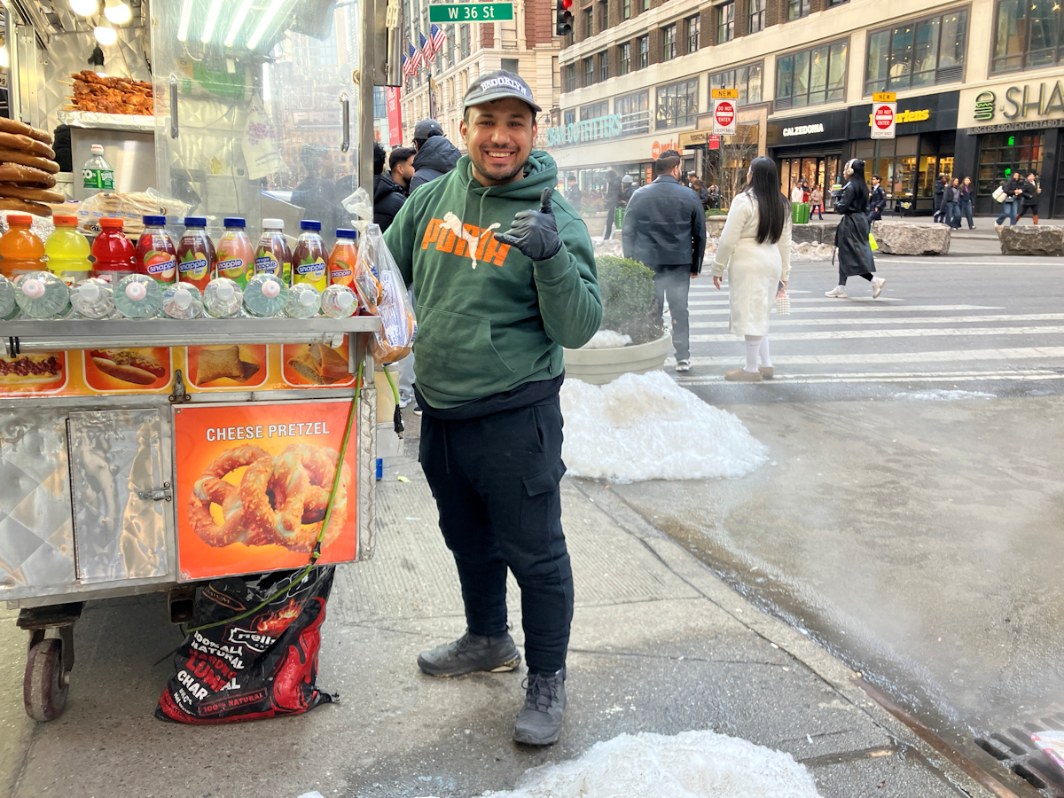 5.Sabrett hot dog vendor Hezo Ahmed drops the beats for the sidewalk runway show. 