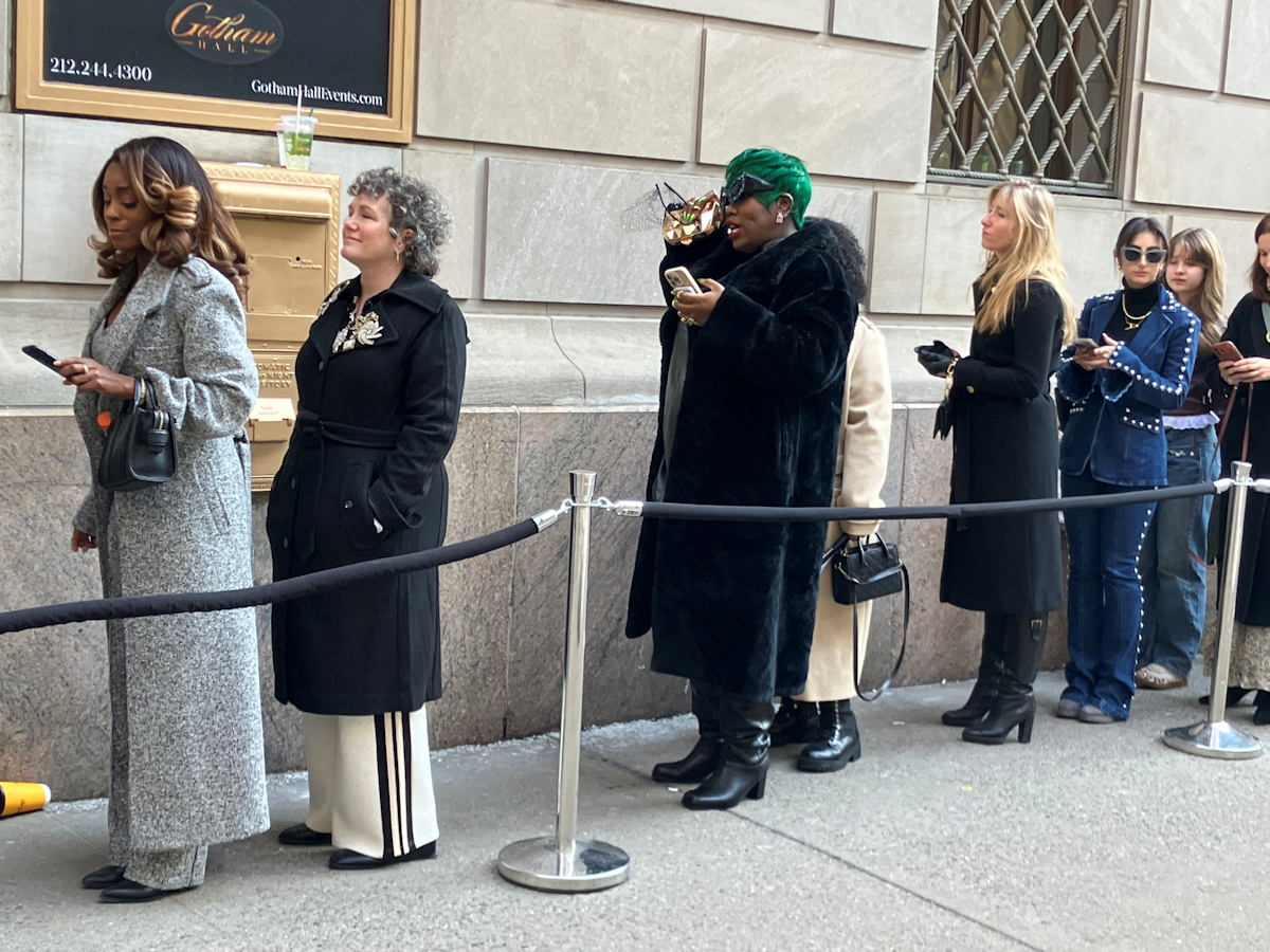 Style on display as New York Fashion Week attendees wait to enter Gotham Hall.