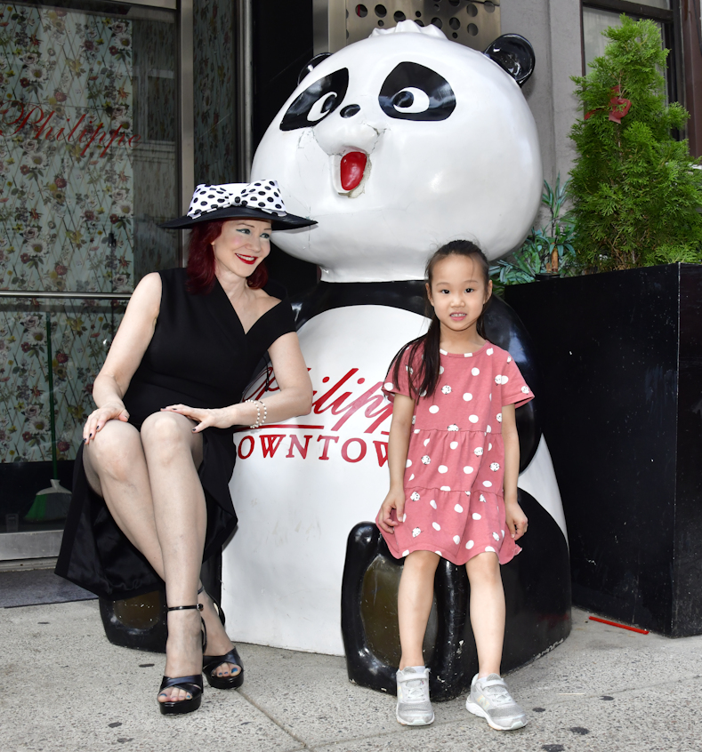 Karen Rempel and passerby with Philippe Chow's panda