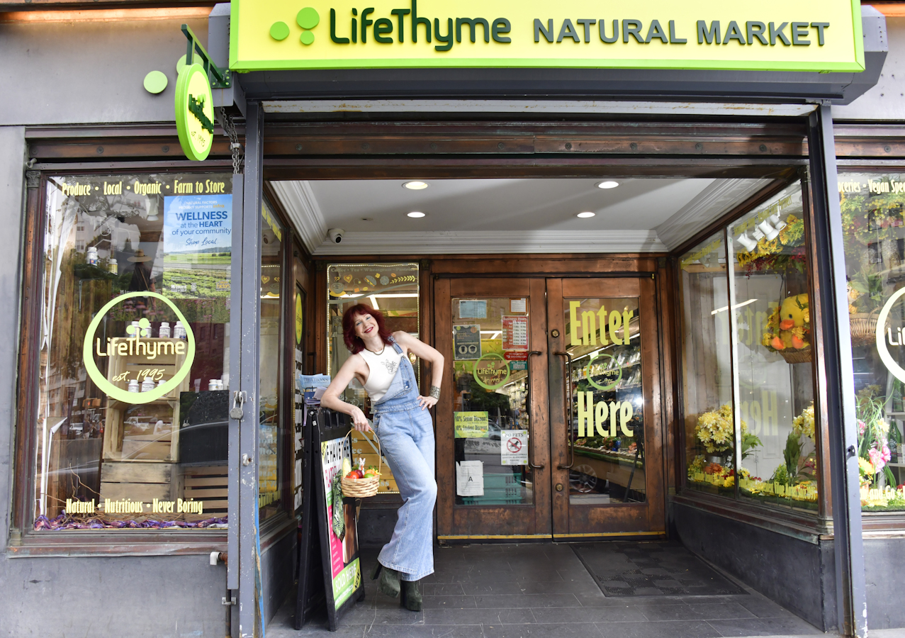 Manhattan model Karen Rempel in front of LifeThyme Natural Foods grocery store on Sixth Avenue in Greenwich Village