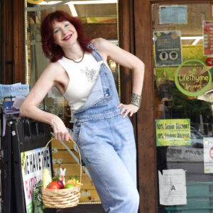 Manhattan model Karen Rempel in front of LifeThyme Natural Foods grocery store on Sixth Avenue in Greenwich Village